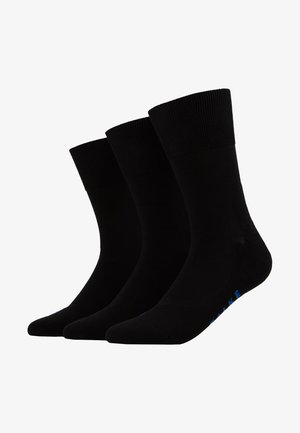Black cotton crew socks with ribbed cuffs, featuring a smooth texture and blue logo detail on the toe. Three pairs displayed.