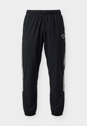 Nike Performance, Pantalon de survêtement - black/dark steel grey