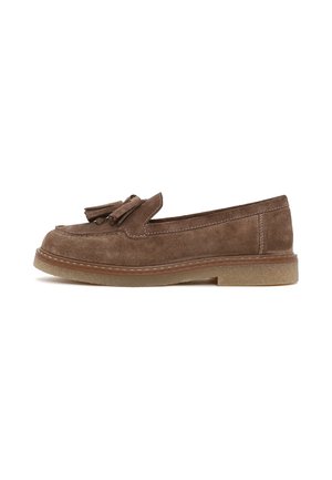 Brown suede loafer with tassels, stitched detailing, and a low rubber sole viewed from the side on a white background.