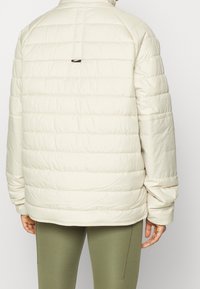 Nike Sportswear Winter jacket - beige