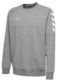 Felpa grigia caratterizzata da un colletto a girocollo, polsini e orlo a costine, e logo bianco Hummel con design a chevron sulle maniche. Materiale in misto cotone.