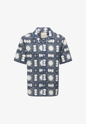 Chemise à manches courtes boutonnée avec un motif géométrique et floral symétrique bleu marine et blanc.