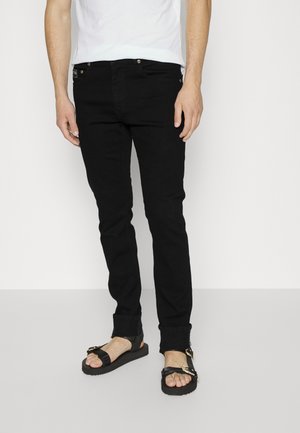 AUSTIN - Vaqueros slim fit - black