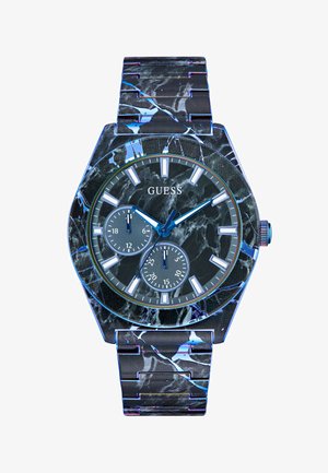 GUESS wristwatch with black marble pattern, silver-tone hour markers, two subdials, and metal link bracelet.