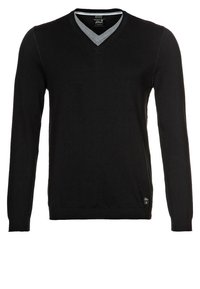 Maglione nero a scollo a V con maniche lunghe, polsini e orlo a coste, con collo interno grigio a contrasto e branding discreto sul lato inferiore.