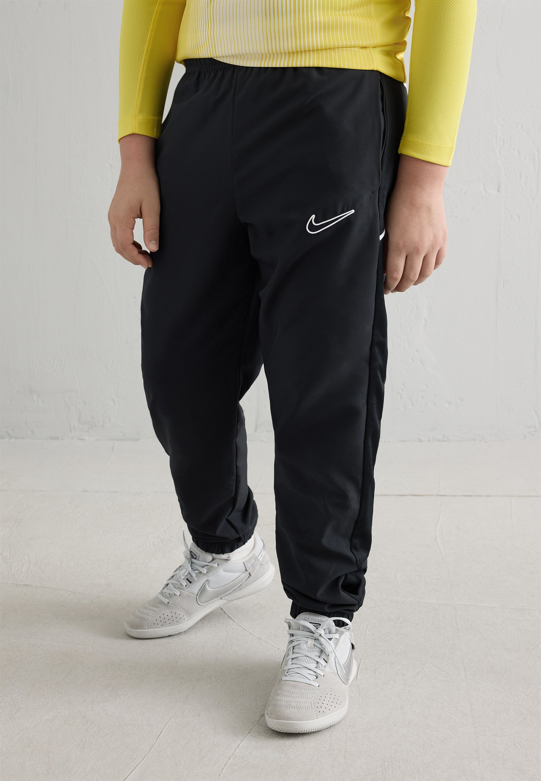 nike swoosh joggers black and white