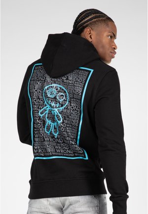 Black hoodie with a large turquoise graphic on the back, featuring a cartoon character and repetitive text pattern. Soft fabric, casual fit.