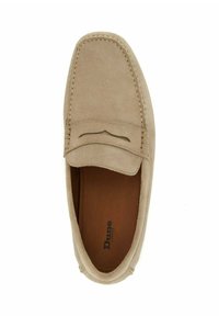Beige suede loafer with a flat, round toe, embossed detailing on the upper, and contrasting leather interior. Stitched trim around the sole.