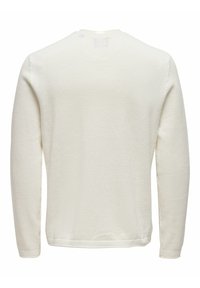 Pull en maille de couleur crème avec un motif texturé, manches longues et encolure ronde. Design simple sans logos visibles.