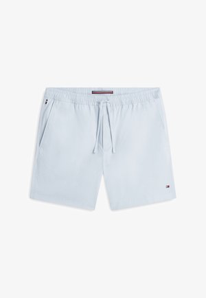 Shorts de bain pour hommes bleu clair avec taille élastique, cordon de serrage, poches latérales et petit logo drapeau rouge, blanc et bleu sur la jambe et la poche.