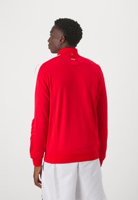 Fila JACKET MANUEL - Trainingsvest - red/white