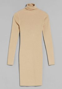 Abito in maglia beige a coste con colletto alto, maniche lunghe e silhouette aderente, che arriva a metà coscia.