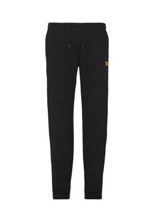 Zwarte katoenen sweatpants met elastische tailleband en trekkoord. Voorzien van zijzakken en contrasterend logo op de bovenste dij. Soepele textuur.