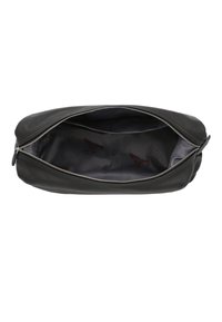 Borsa in pelle nera con una ampia apertura, zip in metallo e interno foderato grigio con un motivo sottile. Forma compatta e rettangolare.