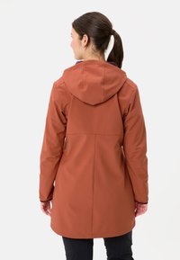 Long brown waterproof coat with a hood, featuring a straight cut and slight detailing around the hem. Smooth texture. Simple, functional design.