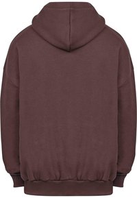 Oversized brun hættebluse lavet af blødt stof, med en stor hætte bagpå, ribbede manchetter og en tekstureret kant i livet.