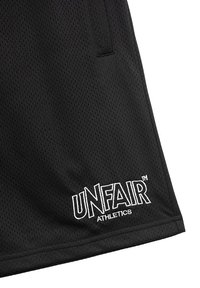 UNFAIR ATHLETICS LABEL - Joggebukse - black