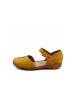 Yellow leather shoe with a rounded toe, adjustable strap, and textured brown rubber sole. Features stitched detailing and floral insole.