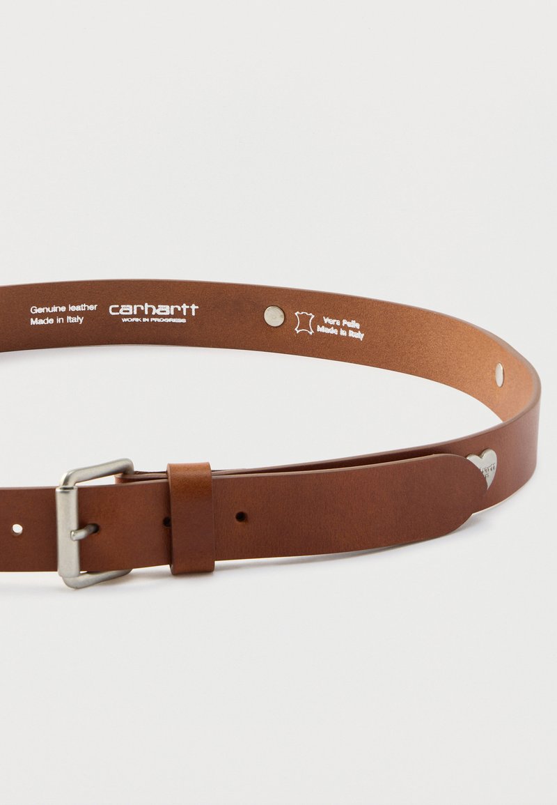 Brown genuine leather belt with a silver metal buckle. Features embossed brand logo and subtle hardware details. Made in Italy.
