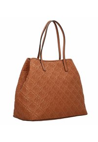 Borsa tote in pelle marrone trapuntata con un motivo a diamante, doppi manici superiori e cuciture nere a contrasto lungo i bordi.
