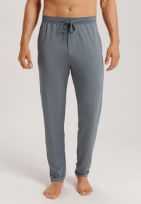Grijze pyjamabroek van zachte stof, met een trekband in de taille en een rechte snit met een gladde textuur.