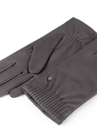 Ein Paar dunkelbraune Lederhandschuhe mit elastischen Handgelenkseinsätzen und einem kleinen runden Metallknopf an einem Handschuh.