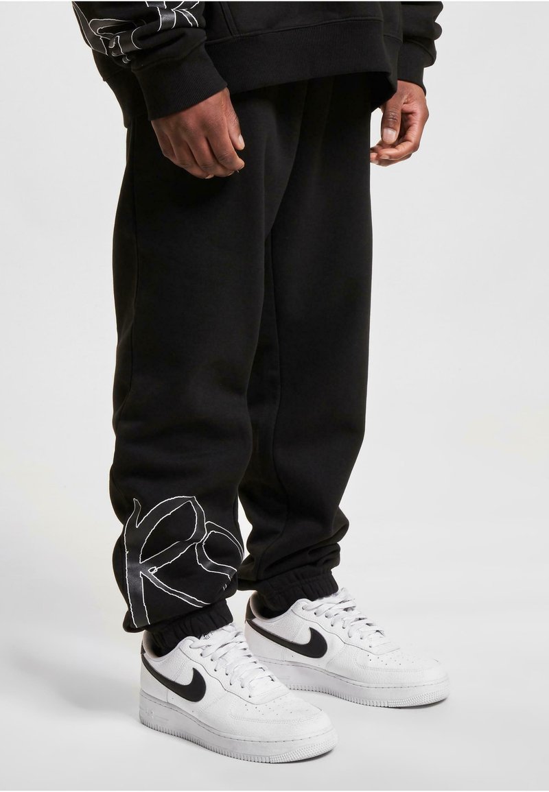 Rocawear Tracksuit bottoms - black