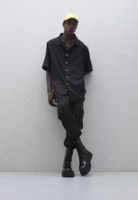 Nikolaj Storm UNISEX - Hemdbluse - black