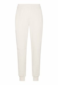 Pantalones de chándal color crema hechos de algodón, con una cintura elástica, puños acanalados y un corte relajado. Presenta una textura sutil.
