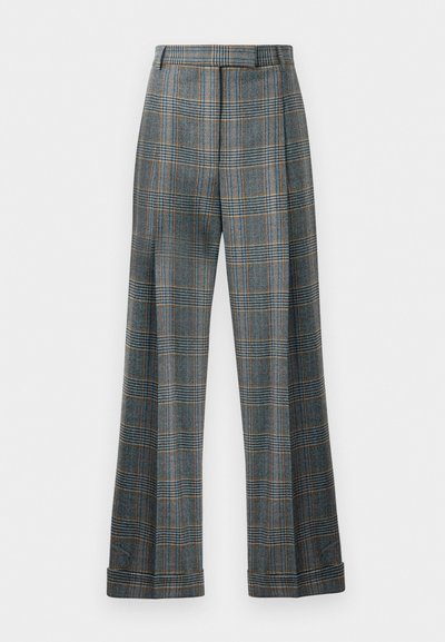 Spodnie w kratę z niebiesko-szaro-pomarańczowym schematem kolorystycznym, szerokimi nogawkami i prasowanymi zagięciami; wykonane z teksturowanej tkaniny.