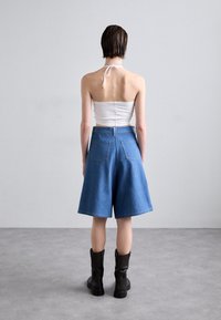 MAITREPIERRE CAGLIO - Short en jean - blue denim