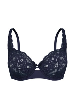 Soutien-gorge en dentelle bleu marine avec un motif floral, bonnets rembourrés, bretelles réglables et finition en dentelle. Présente un petit accent en forme de trou de serrure à l'avant.