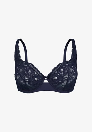 Soutien-gorge en dentelle bleu marine avec un motif floral, bonnets rembourrés, bretelles réglables et finition en dentelle. Présente un petit accent en forme de trou de serrure à l'avant.