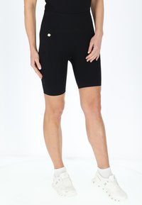 Swedemount RIBBED SEAMLESS SHORT TIGHTS - Shorts - black