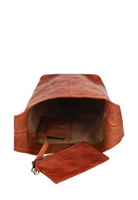 Brown leather tote bag featuring a spacious interior, a smooth texture, and a detachable wallet with a subtle embossed logo.