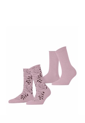 Zwei Paar hellviolette Socken, eines einfarbig und eines mit dunklem Blattmuster, nebeneinander auf weißem Hintergrund dargestellt.