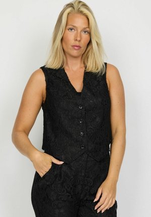Sort blondelædervest med V-udskæring, ærmeløs design og knaplukning. Har intrikate blomsterdesigns og en tætsiddende pasform.