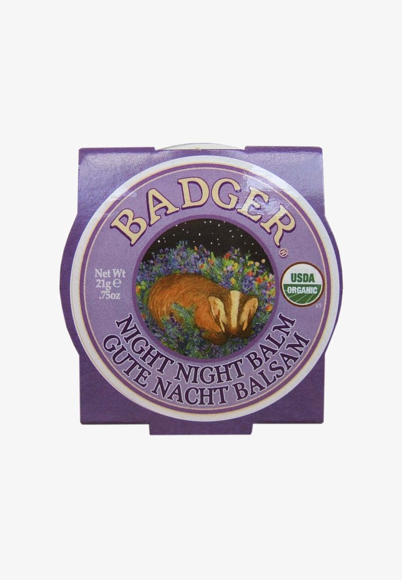 Badger Night Night Balm, pyöreä violetti astia, jossa on mäyräkuvaus kukkien ympäröimänä, merkitty USDA Organic -tunnuksella. 21g.