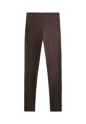 Barna sportleggings, sima felülettel, lapos varrásokkal és cipzáros zsebekkel mindkét oldalon. Testhezálló kialakítás rugalmas anyagból.