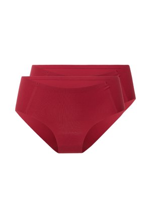 Deux slips rouges unis, sans couture, taille haute, empilés sur un fond blanc.
