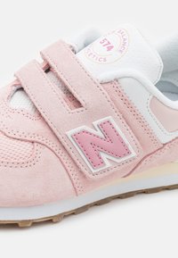 New Balance 574 - Baskets basses - pink