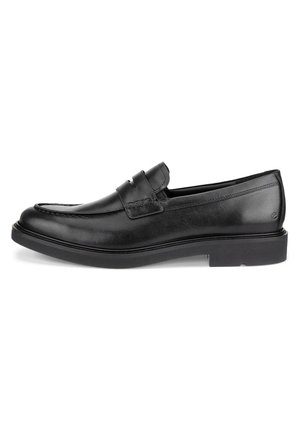 Schwarze Lederloafer mit runder Zehenform, dekorativer Naht und einer niedrigen, flachen Gummisohle. Verfügt über ein schlupfbares Design und minimales Detail. 