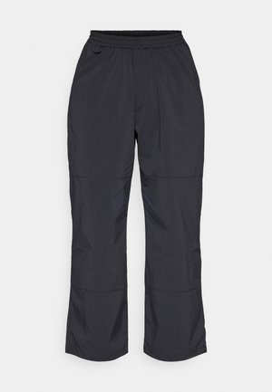 Schwarze, leichte, wasserabweisende Hose mit elastischem Bund, geradem Bein und subtiler Glanztextur.