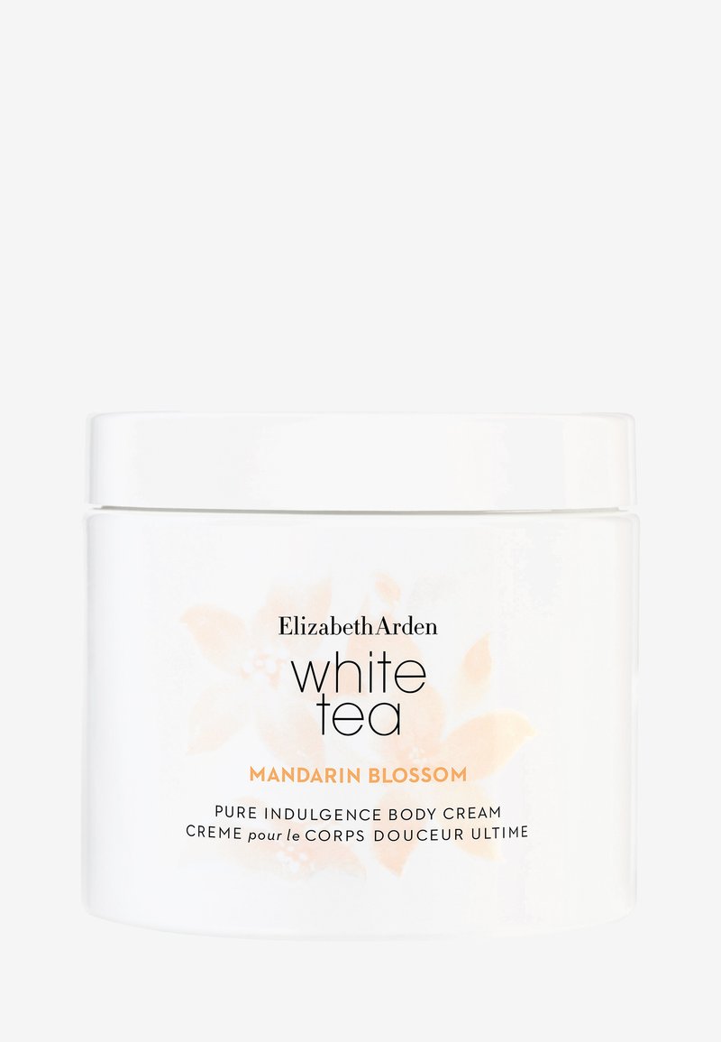 Vit burk med Elizabeth Arden White Tea Mandarin Blossom kroppskräm. Har en mjuk, vit konsistens med en blomsterdesign och svarta bokstäver.