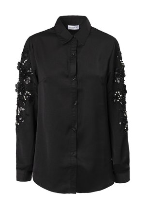 Sort skjorte med knapper lavet af glat stof med broderede blomster og pailletdetaljer på ærmerne. Den har krave, lange ærmer og en tætsiddende pasform.