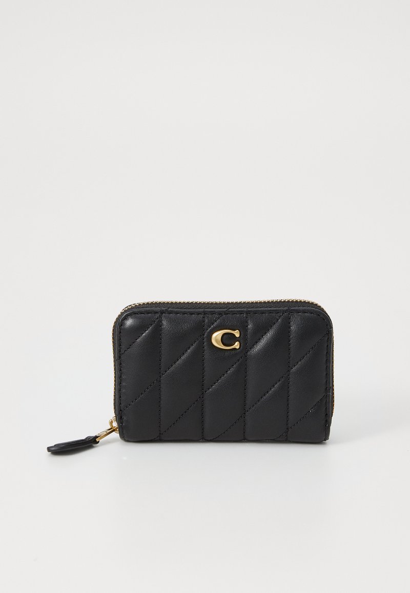 Black leather wallet with a quilted pattern, gold hardware accent, and zip closure. Features a decorative logo on the front.