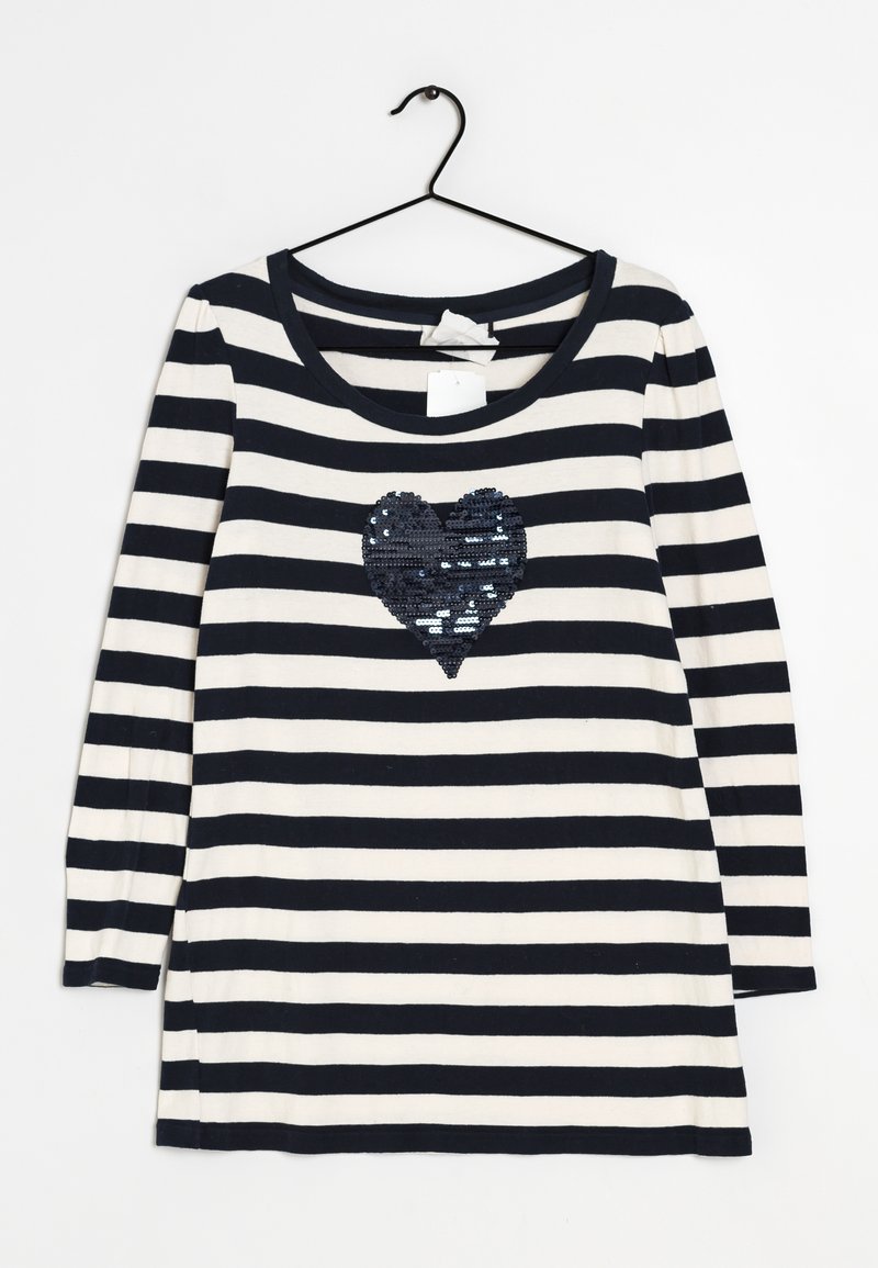 Gestreiftes Langarmhemd in Marine und Creme mit einem Pailletten-Herzdruck. Hergestellt aus weichem Stoff, mit einem runden Ausschnitt und seitlichen Schlitzen.