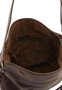 Borsa a mano in pelle marrone con chiusura zip, dotata di un'esterno liscio e una tasca interna con zip, foderata in un tessuto morbido.