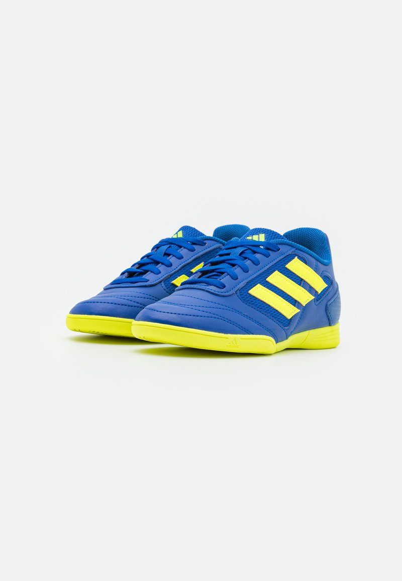 adidas blue and yellow boots