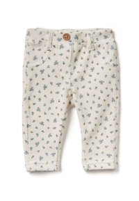Romper voor peuters in crèmekleur met kleine blauwe en gele bloemenprint, voorzien van een houten knoop en twee voorzakken. Gelaagd corduroy stof.